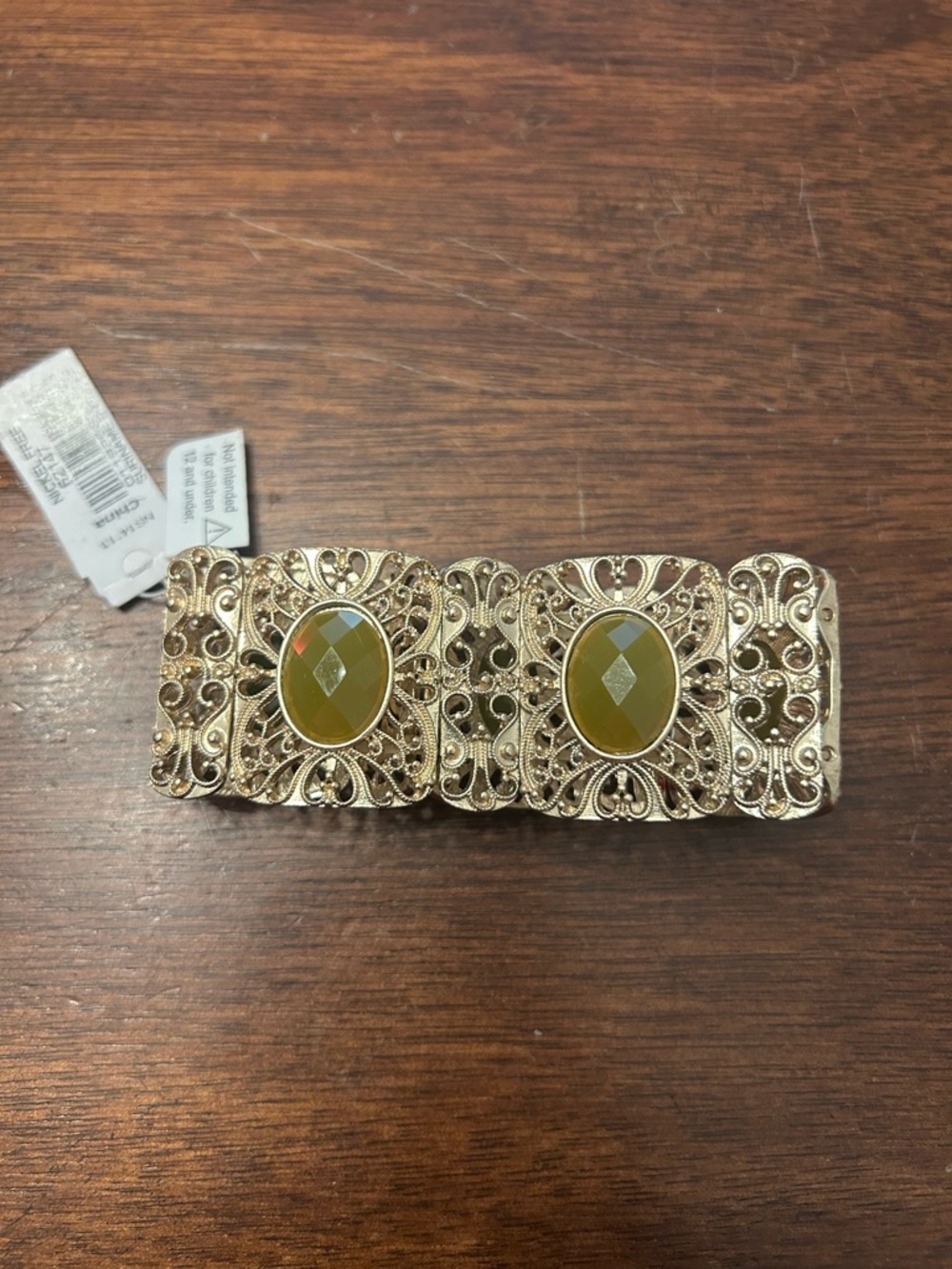 Ornate Gold Filigree Stretch Bracelet with Olive Green Stones